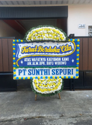 Papan Bunga Duka di Titisan