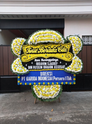 Papan Bunga Duka di Titisan