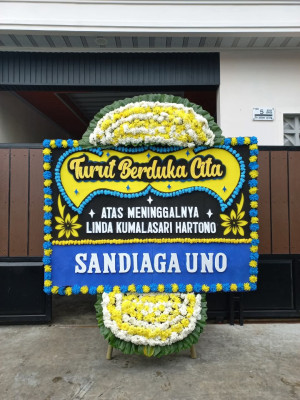 Papan Bunga Duka di Titisan